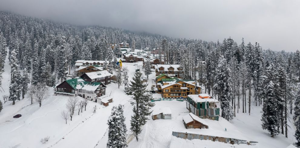 Heavy Snowfall is heppning in Gulmarg, Kashmir during winters and tourist enjoying in Kashmir tour package